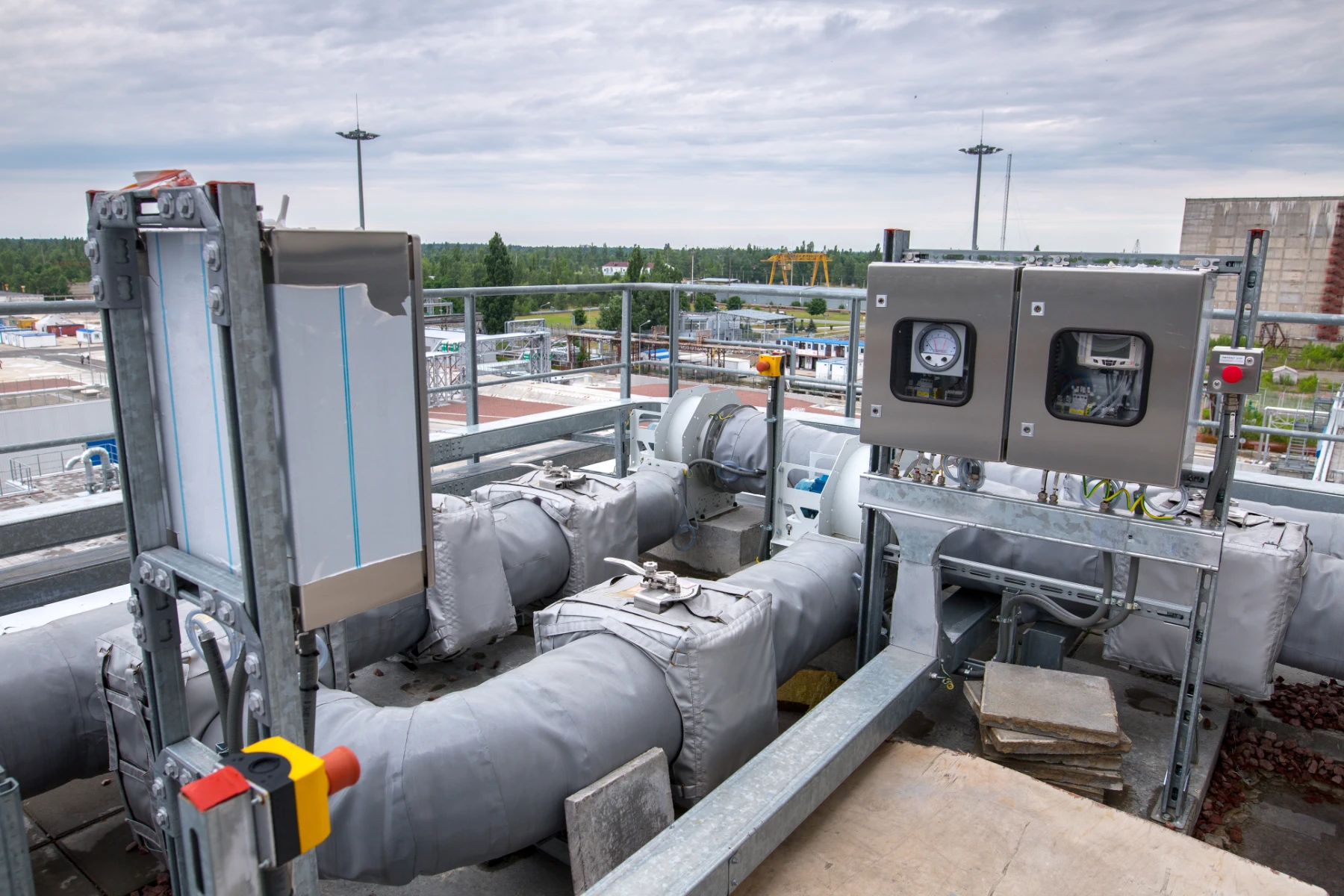 Pipes and Control Panels in Industrial Setting